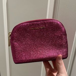 Pink Michael Kors cosmetic pouch
